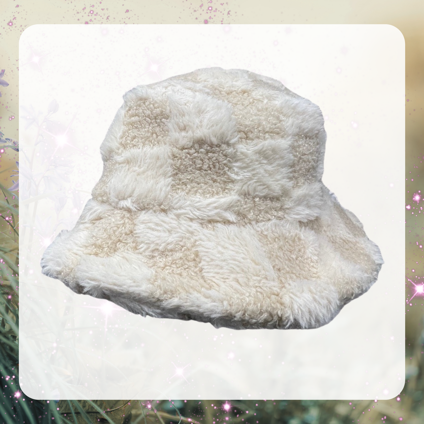 Photo is of an off white / beige furry checkerboard bucket hat.