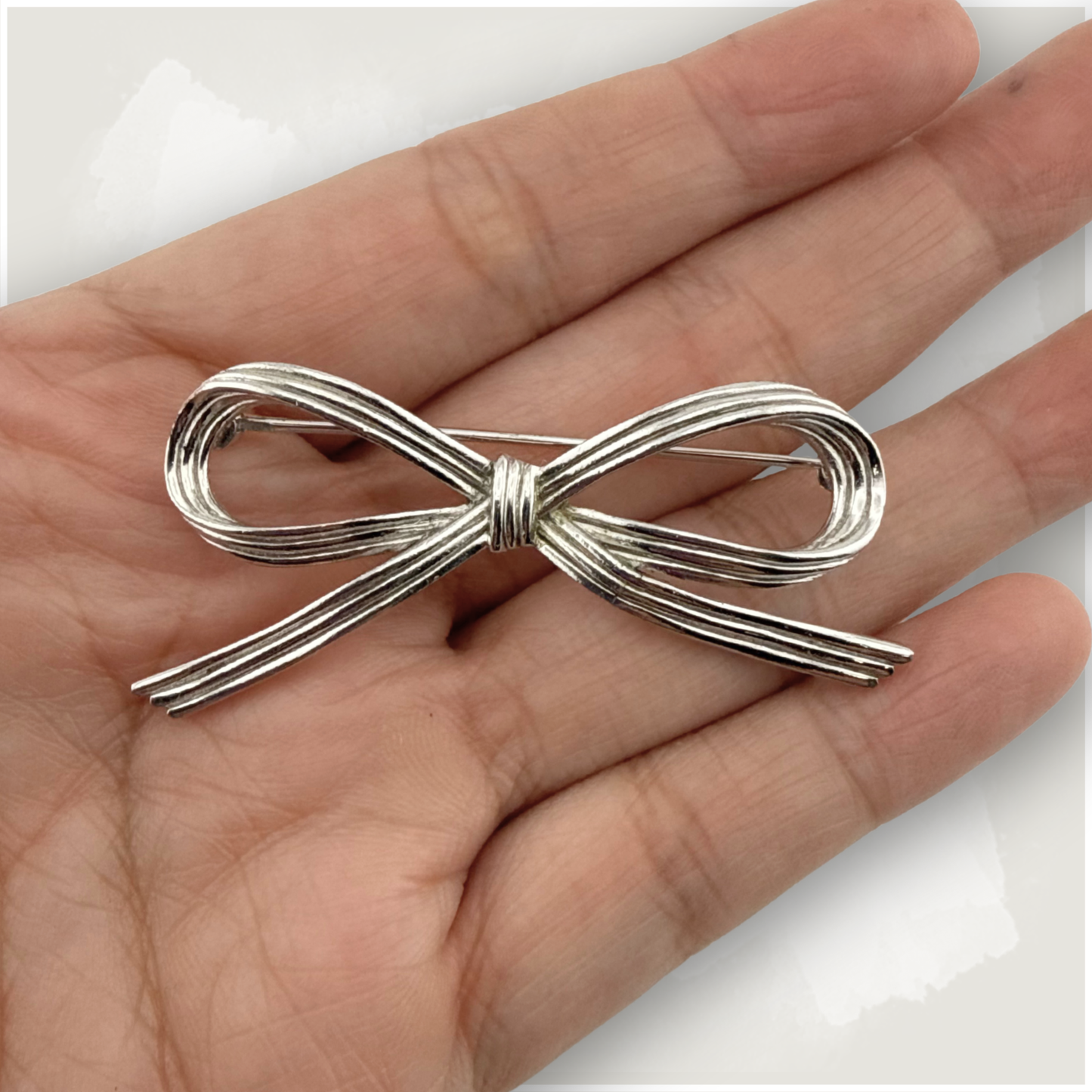 Crown Trifari Silver Tone Bow Brooch