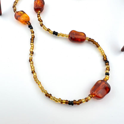 Retro Glam Tortoiseshell Festival Sunglasses with Amber Beaded Chain