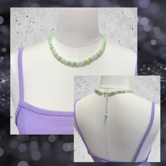 Handmade Pearls and Pastel Beaded Choker Necklace by Extra Kitsch. Faux pearls, blue and green glass beads on an adjustable length choker for timeless elegance. Shows the front and a smaller photo of the back on a mannequin. Shades of green necklace is featured.
