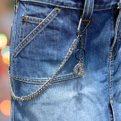 Durable stainless steel wallet chain with customizable clips and wolf keychain. Displayed on a mannequin.