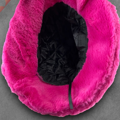 Sassy "That's Hot" Pink Furry Festival Bucket Hat – a vibrant accessory for making a bold fashion statement at any event! Displayed on a table. Inside view.