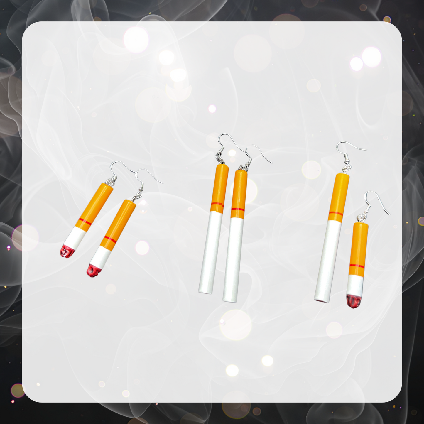 Picture shows three pairs of cigarette charm earrings. The first pair is two half smoked cigs with the ends burning, the second pair is two full unlit cigs, and the third is one full unlit cig with a half lit cig. 