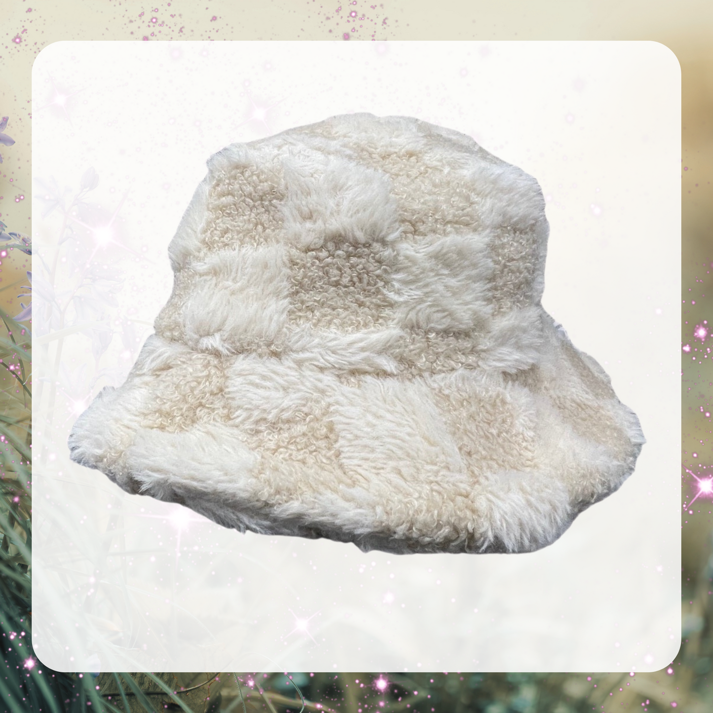 Photo is of an off white / beige furry checkerboard bucket hat. 