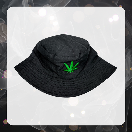 Picture shows a black bucket hat with a green embroidered marijuana pot leaf on the front.